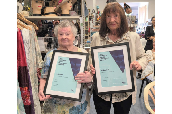 Volunteers Yvonne Dunt and Claire Weaver receive Volunteer Honour Roll awards at Diamond Creek Op Shop AGM